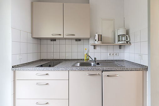 Uni Gästehaus Einzelappartement Küchenzeile